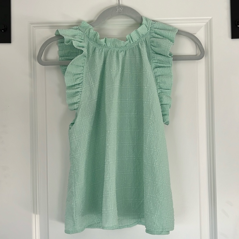 By The River light green blouse